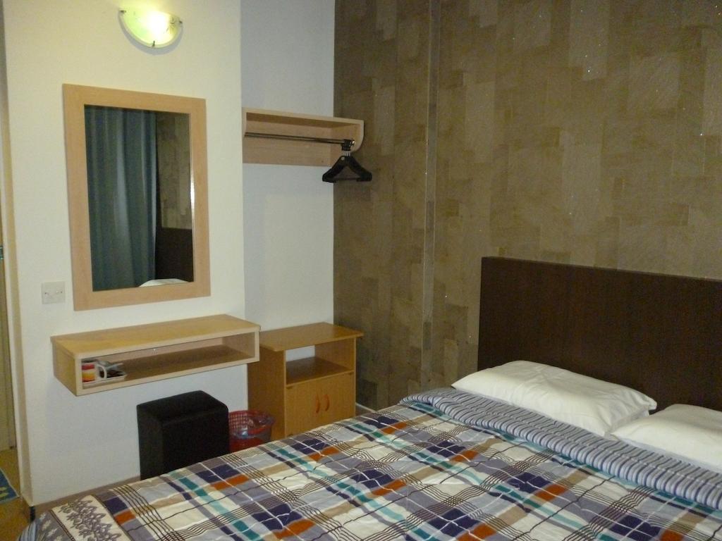 G Six Hotel Sitiawan Zimmer foto