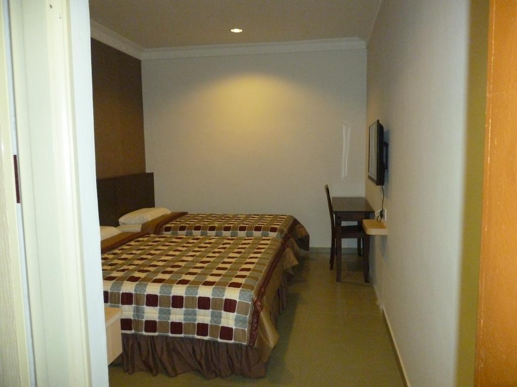 G Six Hotel Sitiawan Zimmer foto